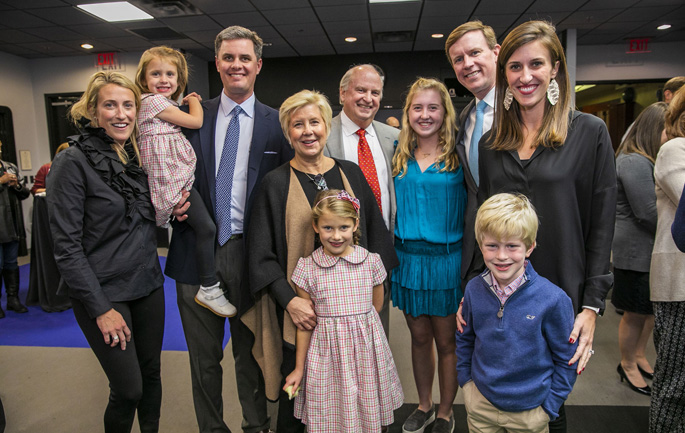 Monroe Carell Jr. Children’s Hospital at Vanderbilt and Vanderbilt University Medical Center leaders, physicians, nurses and staff recently celebrated John W. Brock III, MD, for his 17 years of service as the first Children’s Hospital Surgeon-in-Chief. Brock, who is now Surgeon-in-Chief Emeritus, will focus on his role as Senior Vice President of Pediatric Surgical Services while also continuing his roles as director of Pediatric Urology and Monroe Carell Jr. Professor. In this photo, Brock (center) celebrates with family at his service reception in the First Tennessee Theatre at Children’s Hospital.