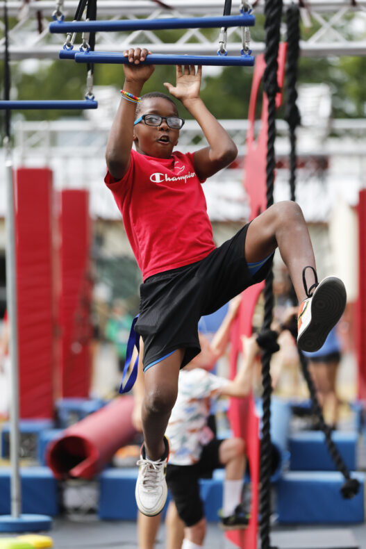 Kobe Alexander, 9, on his Ninja Nation run at Camp Hope. (photo by Donn Jones)