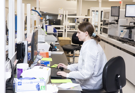 Paige Smith, who works in Hematology, tracks results during a recent mock go-live event held at the MetroCenter laboratory facility. (photo by Susan Urmy)
