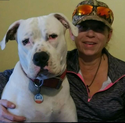 Michelle O’Donnell with her dog, Oni, who played a role in O’Donnell’s shoulder injury.