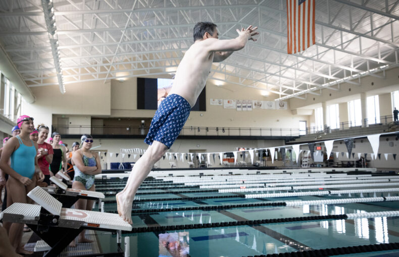 Ben Ho Park, MD, director of VICC, cannonballs into the pool. (photo by Erin O. Smith)