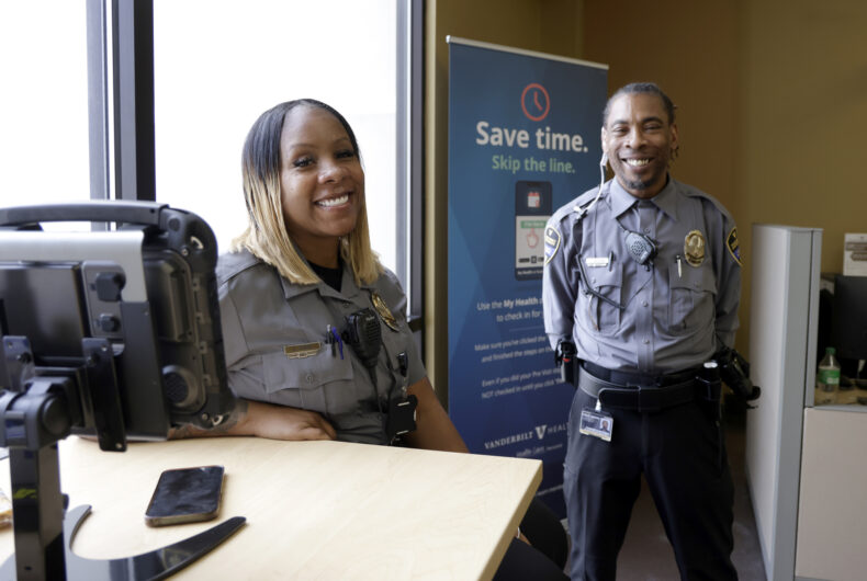 Safety officers Shinita Davis and Treaginald Hudson help check in visitors at Vanderbilt Health One Hundred Oaks after new security features were rolled out in March. (photo by Donn Jones)