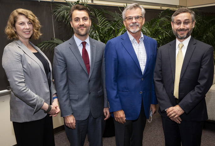 Taking part in the panel discussion were, from left, Melinda Buntin, PhD, Stephen Patrick, MD, MPH, Ernie Fletcher, MD, and Michael Meit, MPH.