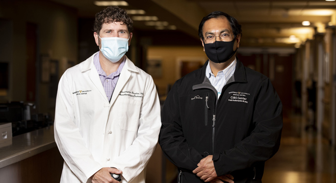 Christopher Hughes, MD, left, Pratik Pandharipande, MD, MSCI, and colleagues are studying two drugs recommended for patients receiving mechanical ventilation in the ICU.