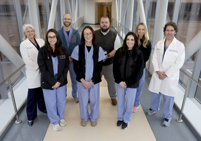 Some members of the Critical Care Outreach Team at Vanderbilt University Hospital include, front row, left to right, Casey Ernfelt, ACNP, Lindsay Trantum, ACNP, Rebekah Pike, ACNP. Back row, left to right, Liza Weavind, MBBCh, Cody Bowers, AG-ACNP, Kipp Shipley, DNP, Megan Shifrin, DNP, ACNP-BC, and Christopher Hughes, MD. (photo by Donn Jones)