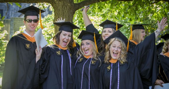 Justin Ellison, Erica May, Joanna Jhant, Rachael Sweeney and Mindy Johnson celebrate at the School of Nursing ceremony. (photo by Susan Urmy)