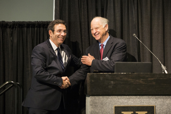 T. Alp Ikizler, M.D., left, received the Excellence in Mentoring Translational Scientists Award from Gordon Bernard, M.D. (photo by Joe Howell)