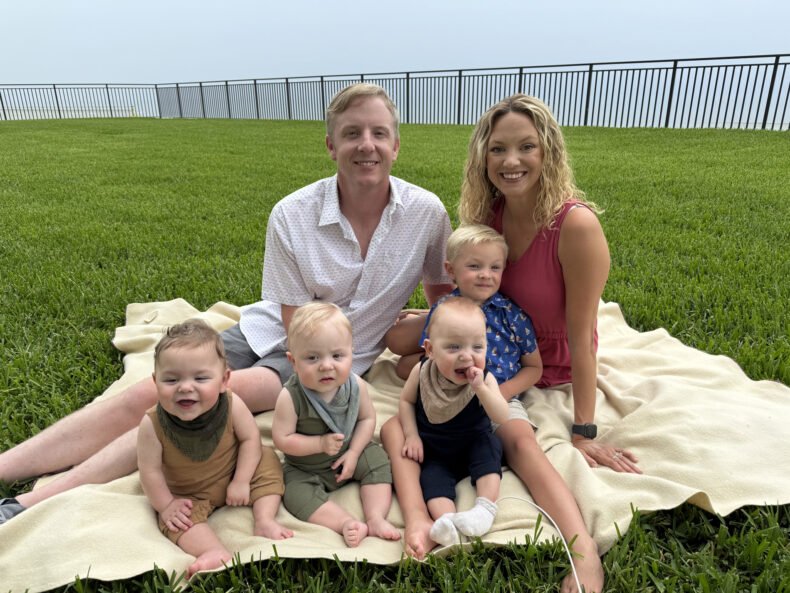 Greg and Monica Barton, who’s holding oldest son Carter, and triplets Matthew, John and Weston.