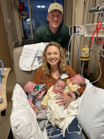 Monica and Greg Barton at Monroe Carell Jr. Children’s Hospital at Vanderbilt with their triplets, Matthew, John and Weston.