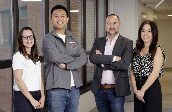 The study team included, from left, Paula Gonzalez-Ericsson, MD, Xiaopeng Sun, Justin Balko, PharmD, PhD, and Brandie Taylor, MS. (photo by Donn Jones)