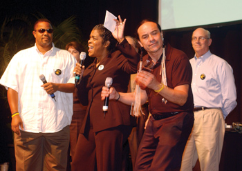 Kevin Johnson, M.D., left, Odessa Settles and Timo Cano led the group in a rendition of John Lennon’s “Imagine.”
photo by Dana Johnson