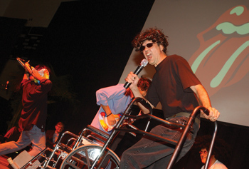 The Rolling Stones — aka Wayne Wood as Mick Jagger, Steve Smart, left, as Keith Richards, Chris Williams, as Ron Wood and Jim Jirgis, M.D., right, as Charlie Watts — couldn’t get no satisfaction during the Employee Recognition ceremony.
photo by Dana Johnson