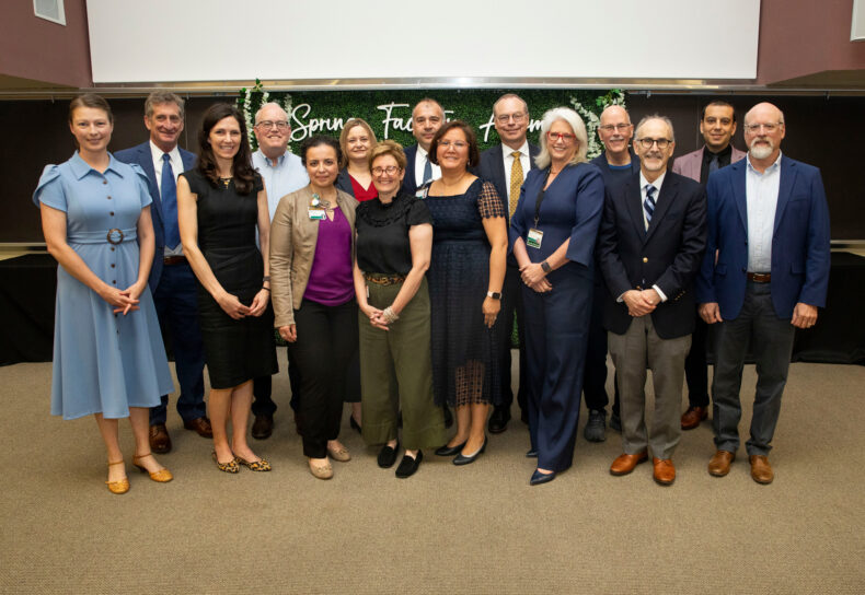 Winners of the 2025 School of Medicine faculty awards included (front row from left) Katie White, Charlotte Brown, Maie El-Sourady, Jill Gilbert, Gisella Carranza Leon, Liza Weavind, David Shaffer and Kevin Schey, and (back row from left) Sean Donahue, Brent Graham, Lisa Monteggia, Ege Kavalali, VUMC President and CEO Jeff Balser, who hosted the Spring Faculty Meeting, Charles Sanders and Ivelin Georgiev. (photo by Susan Urmy)