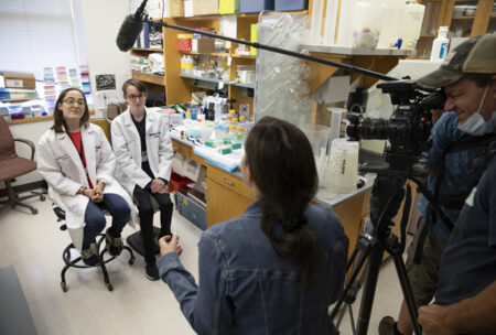 Twins Julianna and Michael Gallup from Sevierville, Tennessee, are interviewed by the NBC News crew.