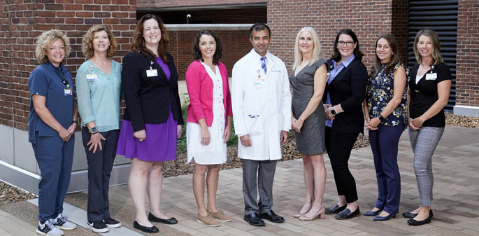 VUMC members of the Quality Improvement Collaborative for COVID-19 Prevention and Control in Middle Tennessee Nursing Homes are, from left, Monique George, RN, FNP, Carole Bartoo, MSN, AGNP-BC, Jacy Weems, Mattie Brady, MSN, Sunil Kripalani, MD, MSc, Sandra Simmons, PhD, Anna Gallion, DNP, APRN, Tara Horr, MD, and April Hanlotxomphou, MSN, FNP. Not pictured are Victor Legner, MD, MS, and Kristina Niehoff, PharmD. (Photo taken by Donn Jones prior to revised mask guidelines)
