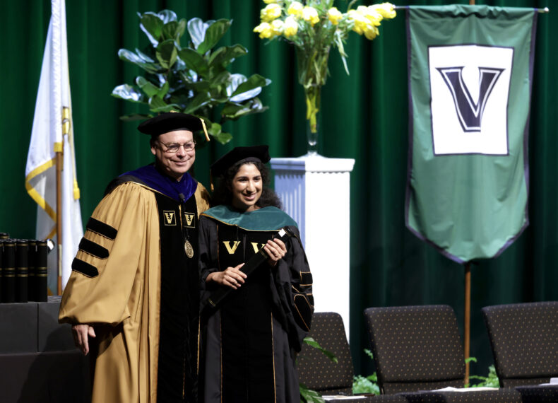 Jeff Balser, MD, PhD, presented Sunaya Krishnapura, MD, her diploma during the ceremony. (photo by Donn Jones)