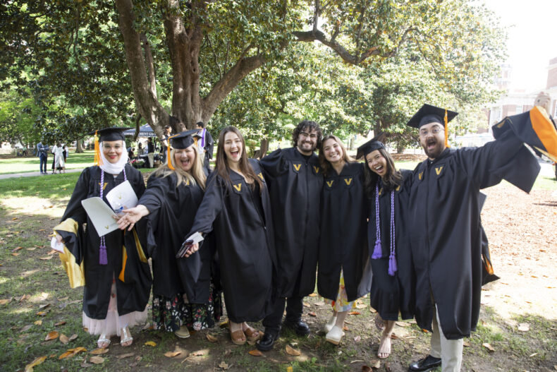 From left are Nursing School graduates Wala’a Bahour, Karen Jones, Kristen Anderson Gonzalez, Adam Dockery, Taylor Gubi, Sarah Sharp and Danne Poulton. (photo by Susan Urmy)