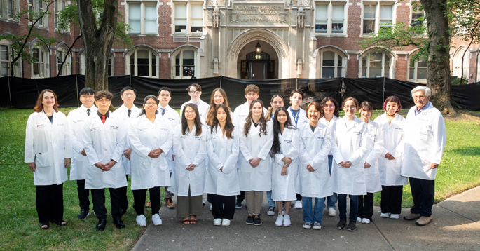 Julie Hudson, MD, far left left, and Billy Hudson, PhD, far right, with this year's cohort of 19 high school students from eight states who participated in the summer research program at VUMC. (photo by Susan Urmy)