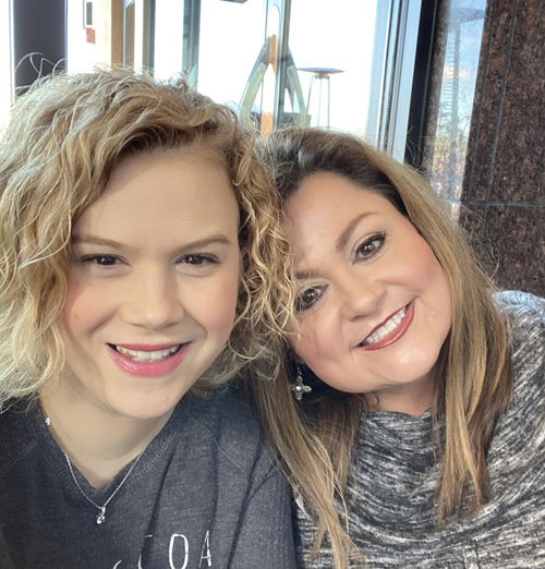 Heart transplant patient Christian Cummins, left, with her mother, Tami Cummins.