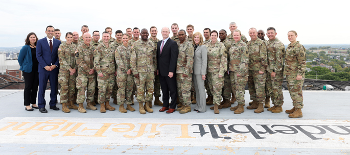 U.S. Army Surgeon General and Commanding General of the U.S. Army Medical Command R. Scott Dingle visited Vanderbilt University Medical Center and posed on the LifeFlight helipad with participants in military-civilian partnerships at the Medical Center. 