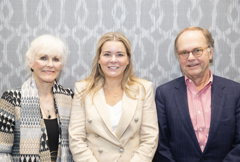 Angela Jefferson, PhD, poses with event attendees Jim and Trish Munro. The Munros have made a planned gift in support of the Vanderbilt Memory and Alzheimer’s Center in honor of both of their mothers who suffered from Alzheimer's disease. (photo by Susan Urmy)