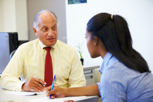 student with counselor