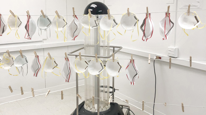 The modified room where ultraviolet (UV) light is used to sanitize used N95 respirators is capable of cleaning about 60 masks at a time.