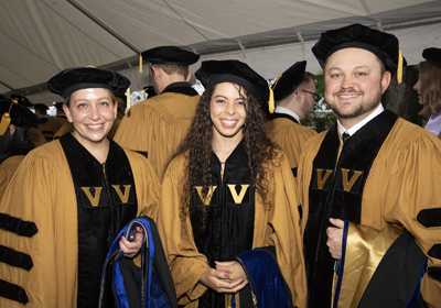 At the Graduate School ceremony are, from left, Jo Ellen Wilson, who received her PhD in Epidemiology, Kellie Marie Williford, who received her PhD in Neuroscience, and Nathan Daniel Winters, who received PhD in Pharmacology.