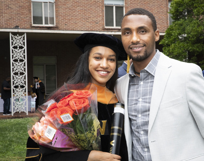 DNP graduate Negest Alemu and her husband, Teshager Lash, following the School of Nursing ceremony.