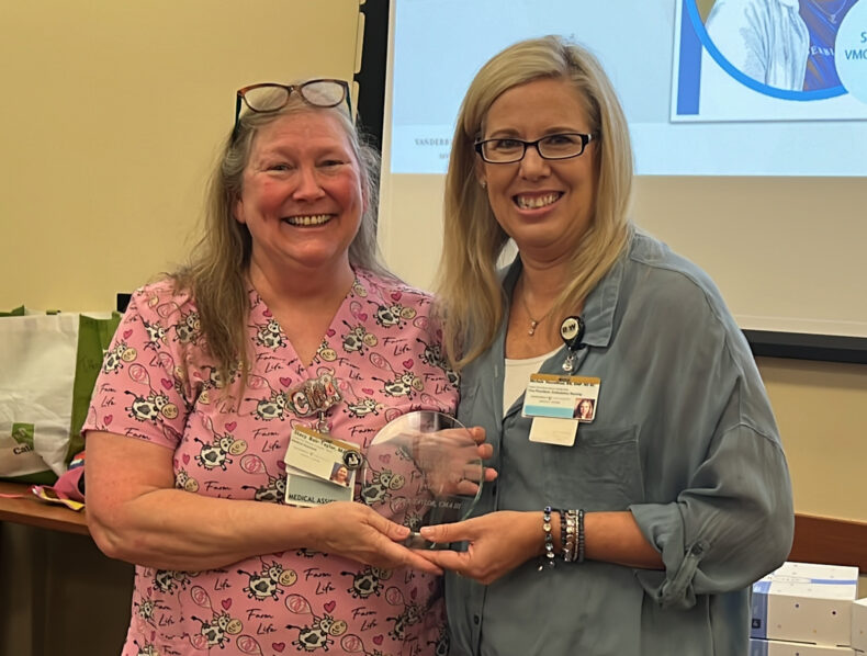 Medical Assistant of the Year award winner Stacy Bair-Taylor, CMA III, left, with Michele Hasselblad, DNP, RN, NE-BC, vice president of Adult Ambulatory Nursing.