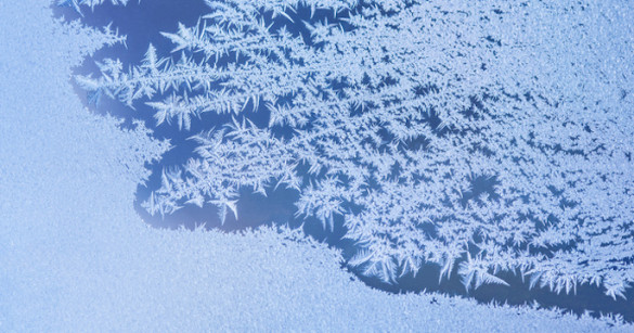window in the process of freezing over