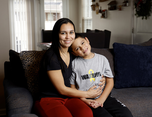 Expandable prosthesis patient Dominic Gamez at home with his mother, Lessly Gamez.