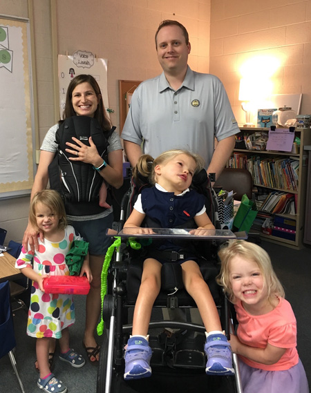 At the annual flag-raising ceremony on April 16, the Honeycutt family will share the story of their daughter, Mikayla, center, whose organs were donated following her death in September. From left are Heather with Caroline (in the baby carrier), Ainsley, Graham and Hailey.