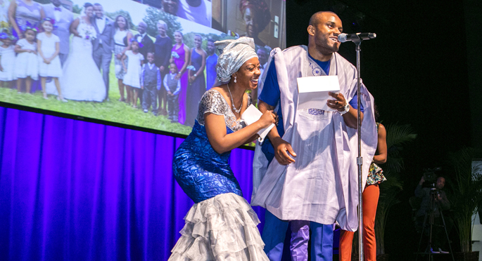 Chike Osita Abana and his wife, Courtney Mitchell Abana, PhD, react after learning at Match Day that he will do his radiation oncology residency at University of Texas MD Anderson Cancer Center.