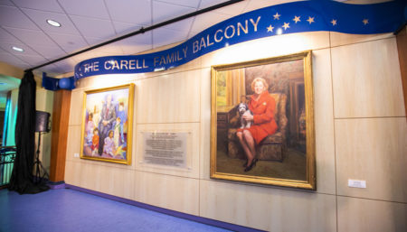 Portraits of Monroe Carell Jr. and Ann Scott Carell highlight the new Carell Family Balcony.