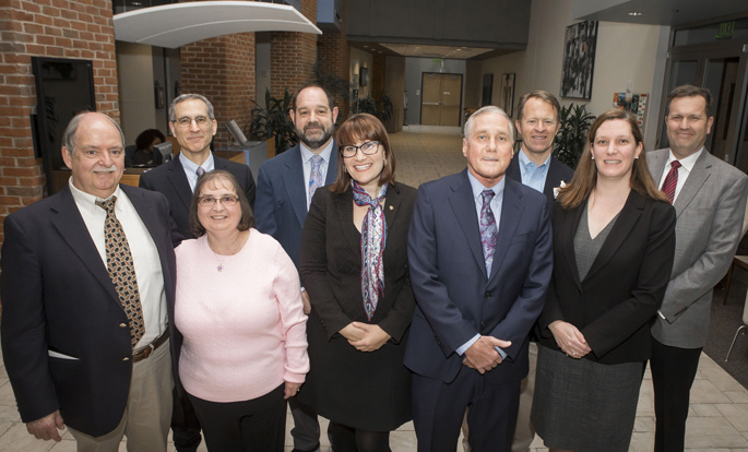 Past and present members of the Vanderbilt Transplant Center, guests and patients attended a celebration of VUMC’s 500th lung transplant at the Student Life Center Feb. 5. Shown here are (back row, from left) Matthew Bacchetta, MD, MBA, MA; Ivan Robbins, MD; Eric Grogan, MD, MPH; and Eric Lambright, MD; (front row, from left) James Loyd, MD; Pam Smith; Erin Gillaspie, MD, MPH; Andy Bolden and Ciara Shaver, MD, PhD. Bolden is the recipient of the 500th lung transplant at Vanderbilt, and Smith, who was transplanted at Vanderbilt in 1990, is the longest-surviving single-lung transplant patient in the United States. Vanderbilt performed its first combined heart/lung transplant in 1987 and its first single-lung transplant in 1990.