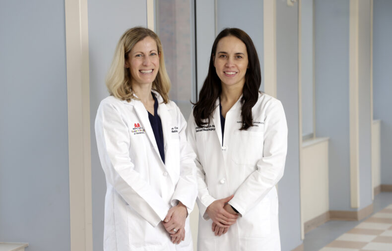 Shiayin Yang, MD, right, with Lauren Corona, MD. (photo by Donn Jones)