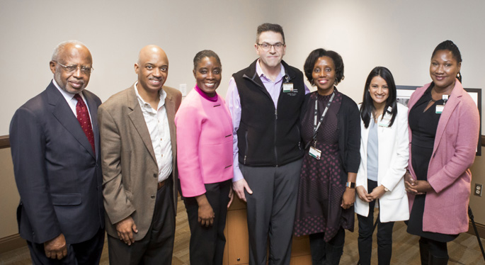 Friends, family and colleagues at the inaugural Dr. Harold Jordan Diversity and Inclusion Lecture included, from left, George C. Hill, PhD; Harold Jordan Jr.; lecturer Lloyda Williamson, MD; Ronald Cowan, MD, PhD; Terako Amison, MD; Reema Dedania, MD, MPH; and Ama Rowe, MD.