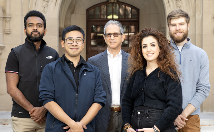 Randika “Randy” Perera, PhD, left, Wenhan Zhu, PhD, Walter Chazin, PhD, Luisella Spiga, PhD, Ryan Fansler and colleagues discovered that beneficial bacteria in the gut impact the competition that occurs between host cells and pathogens for the essential nutrient iron. (photo by Erin O. Smith)