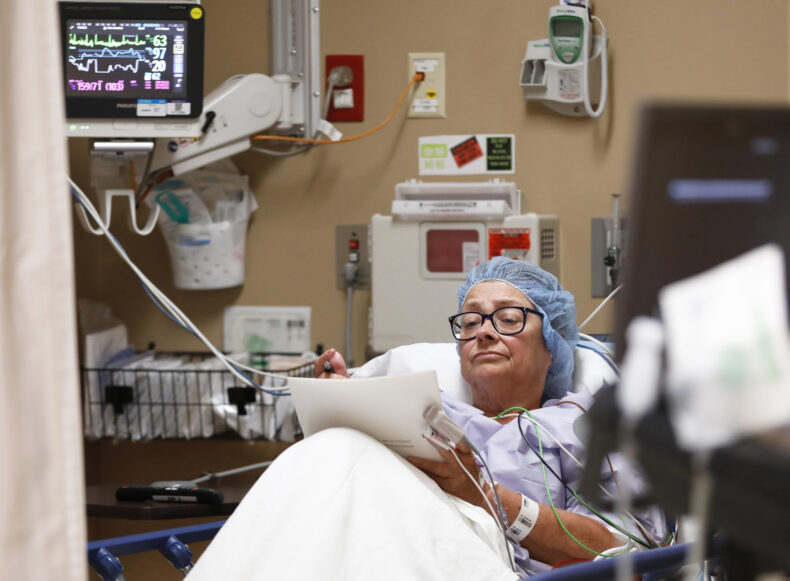 Christine Hayse has had two bouts with cancer and a heart attack. Due to pre-existing conditions and her income level as a hairdresser, she can’t afford insurance premiums. The free surgery Orthopaedics Outreach Day provides is the only way to stop the burning pain in her right arm. (photo by Donn Jones)