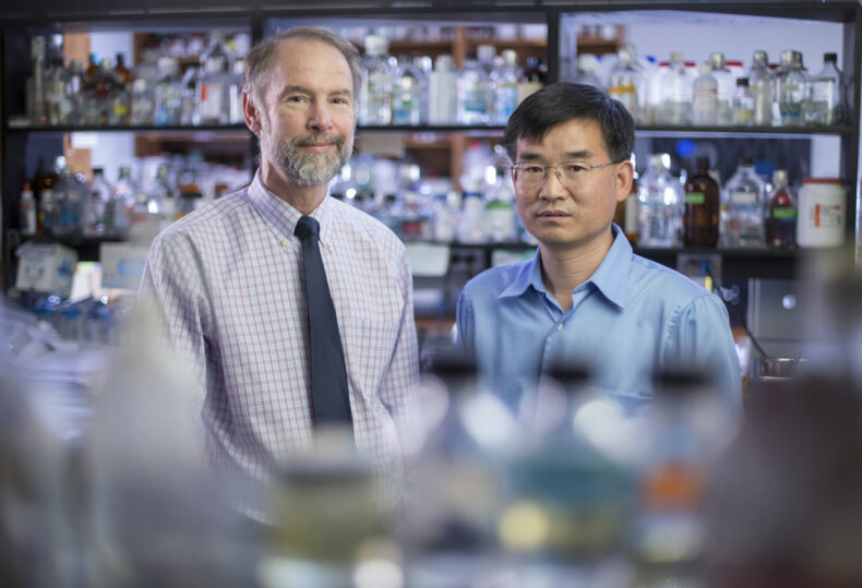 Raymond Harris, MD, left, and Ming-Zhi Zhang, MD, MSc, in the lab. (photo by John Russell)