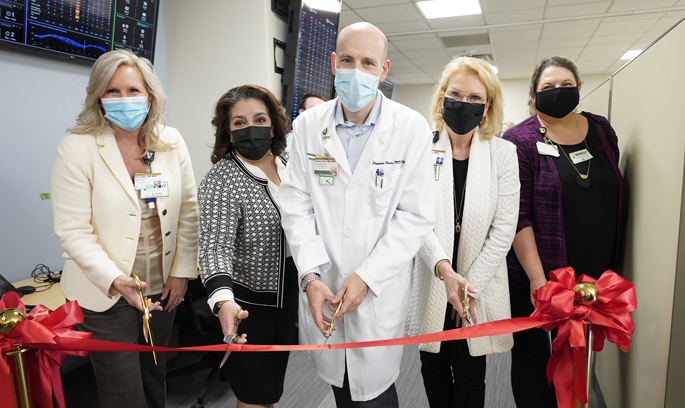 On hand for the ribbon cutting at Vanderbilt University Adult Hospital’s new Operational Control Center were, from left, Shon Dwyer, MBA, RN, Schiara Gonzalez Parker, MBA, MSN, Stephan Russ, MD, MPH, Lee Ann Liska, MBA, and Susan Beggerow, MA.