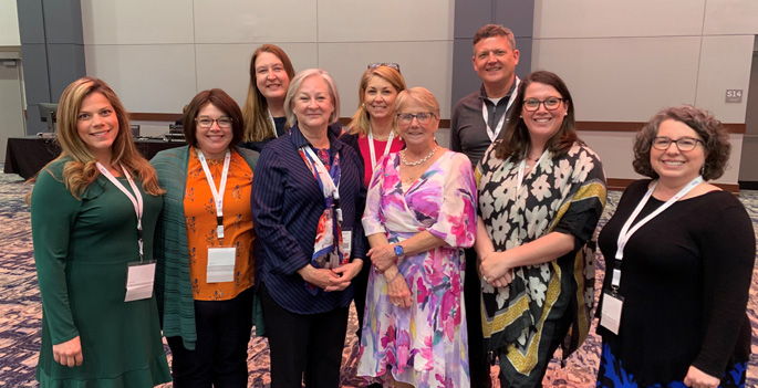 Nurses attending the Fuld National Institute EBP Summit included, (front row, from left) Lindsey Netzel, MSN, RN, CCRN, Ashley Ried, MMHC, RN, CPPS, Patti Runyan, DNP, MBA, RN, NEA-BC, Lynn Gallagher-Ford, Anna Gallion, DNP, APRN, Laura Culwell, MSN, RN, (back row, from left) Jensine Russell, DNP, RN, NE-BC, Vicki Jones, MSN, RN, NE-BC, and Jon Coomer, MSN, RN, PMHNP-BC.