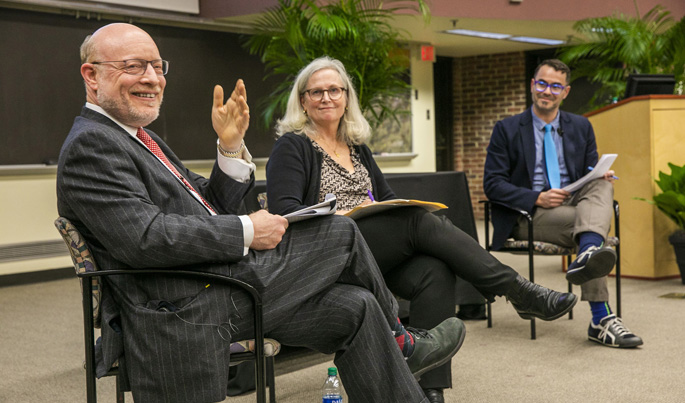 The health care proposal to provide Medicare for all was the focus of a panel discussion at the fall Research into Policy and Practice Lecture. Panel participants included, from left, Chip Kahn, Carol Paris, MD, and moderator Dan Gorenstein.