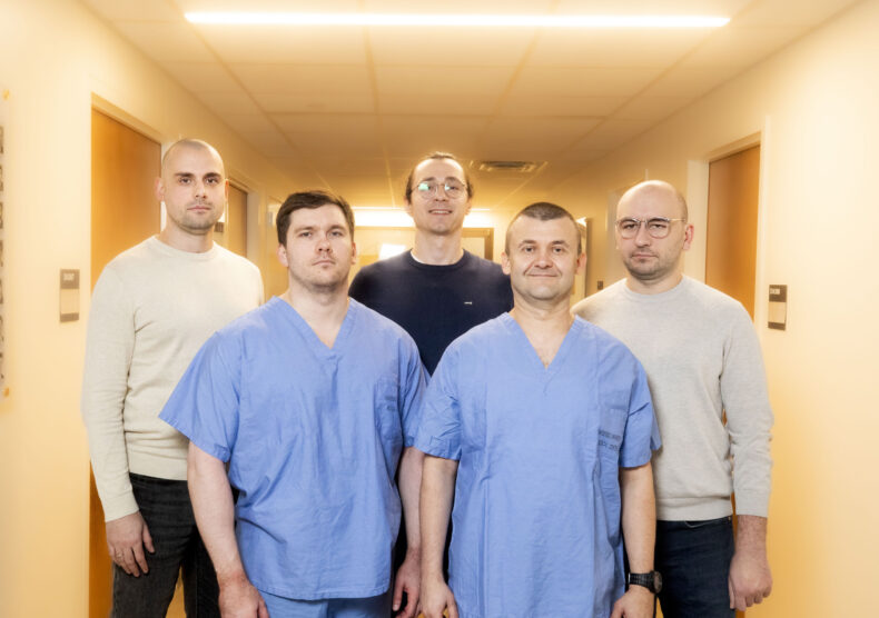 The team from Ukraine included (front row, from left) Yevhen Haidarzhi, MD, PhD, Andrii Zhylenko, MD, (back row, from left) Oleksandr Dubnevych, MD, Illia Yeremieiev, MD, and Vlad Kropelnytskyi, MD. (photo by Susan Urmy)