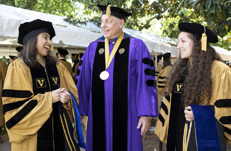 Neil Osheroff, PhD, professor of Biochemistry, talks with advisees Esha Deepak Dalvie, PhD, left, and Alexandria Argelia Oviatt PhD.