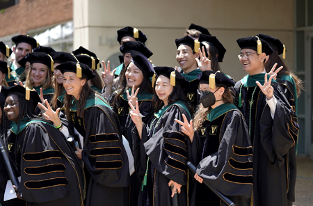 The School of Medicine Class of 2022 poses outside Light Hall following the ceremony.