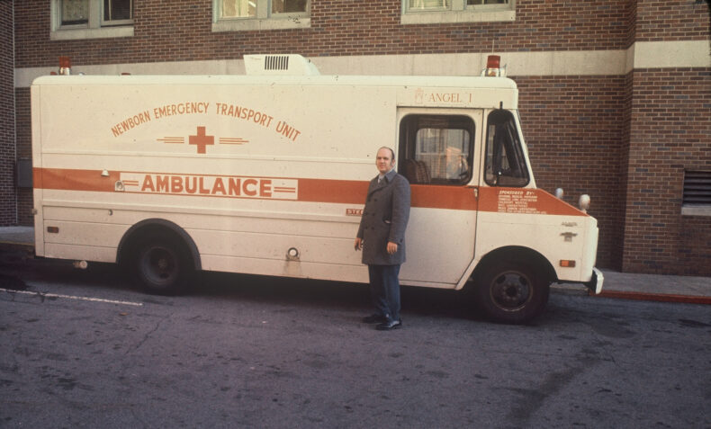 Dean Driver with Angel 1 circa 1974 in front of the former Emergency Department entrance in Medical Center North.