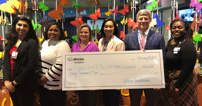 From left are Purnima Unni, MPH, Allstate’s Andrea Richard, Vivian Mink and Allison May, Harold Lovvorn III, MD, and Eppiphanie Benton.