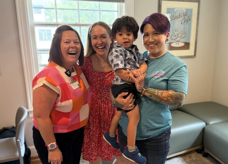 Jess Chan, right, and her son, Kai, at the Vanderbilt Music Cognition Lab with Amy Smith, PhD, MT-BC, left, and Emily Thompson, PhD, AuD.